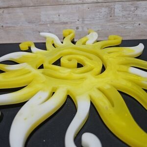Vibrant Yellow and White Sun Sculpture
